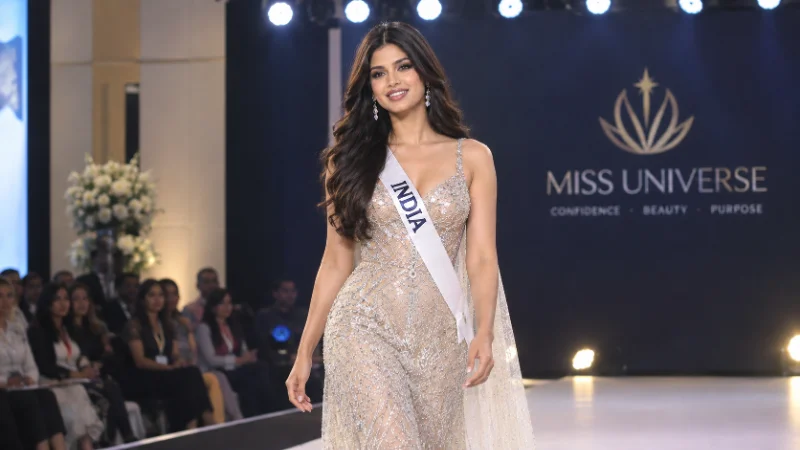Harnaaz Sandhu walking the runway during an early regional pageant